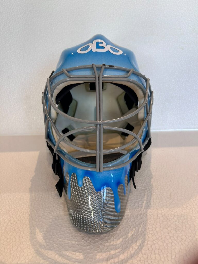 OBO ROBO FG Flame Blue Medium field hockey goalkeeper helmet with silver wire cage - Front